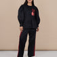 Ariya Threads Women’s Black Co-Ord Set with Red Sequin Pocket & Contrast Stripe Pants